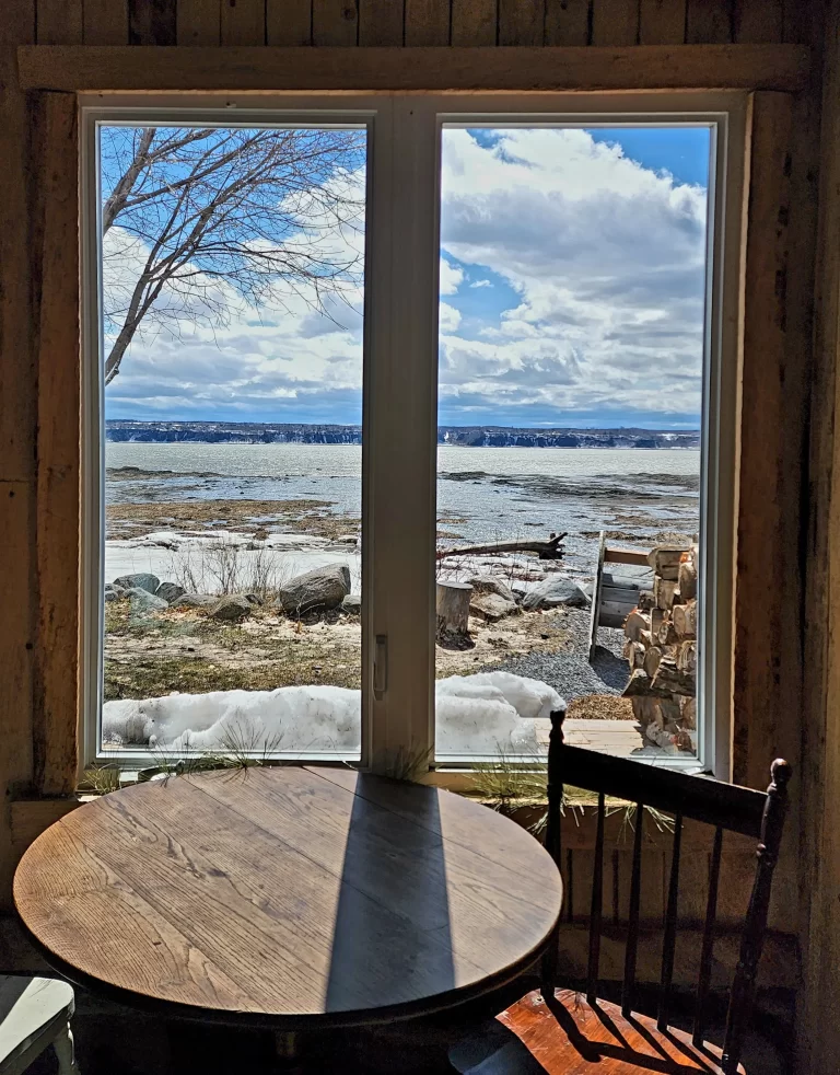 view of the lawrence river from a local shop in ile d'orleans