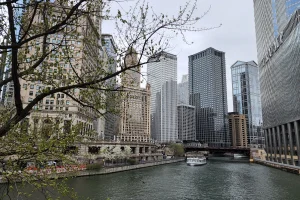 a view of chicago buildings over the river